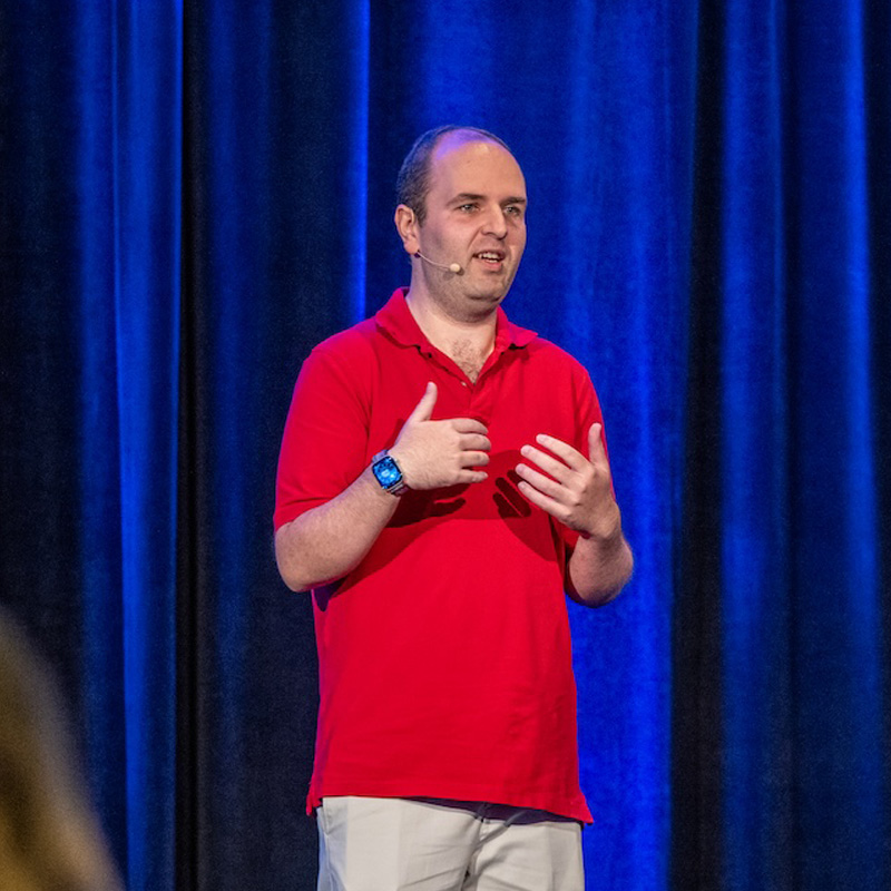 Rehan Butt chatting with the team